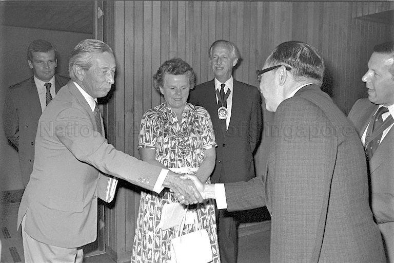 Member of delegation led by Lord Mayor of London Sir Christopher Leaver (right) exchanging greetings with Minister for National Development Teh Cheang Wan (second from right) at Ministry of National Development Building