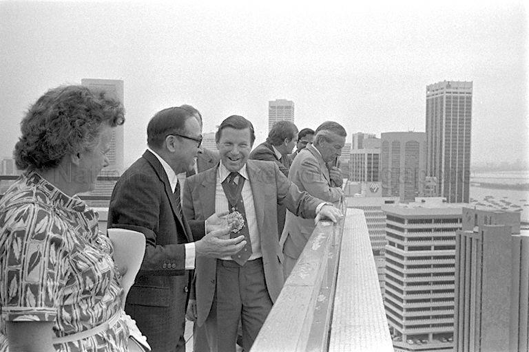 Minister for National Development Teh Cheang Wan (second from left) showing the view from the top of Ministry of National Development Building to visiting Lord Mayor of London Sir Christopher Leaver (third from left) and delegation