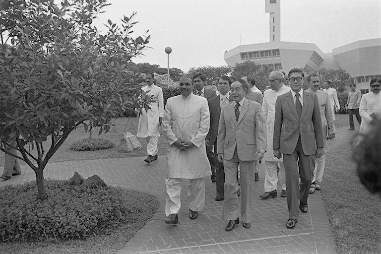President Zia ul-Haq of Pakistan, who is on a three-day state visit to Singapore, with Minister for Home Affairs Chua Sian Chin (right) and Chairman of Jurong Town Corporation Tang I Fang making their way to Garden of Fame at Jurong Town Hall