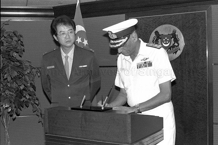 Chairman of the Chiefs of Staff Committee, Indian Armed Forces and Chief of Naval Staff, Indian Navy, Admiral Vijai Singh Shekhawat signing the guest book when he arrives to call on Deputy Prime Minister and Minister for Defence Dr Tony Tan Keng Yam at MINDEF.