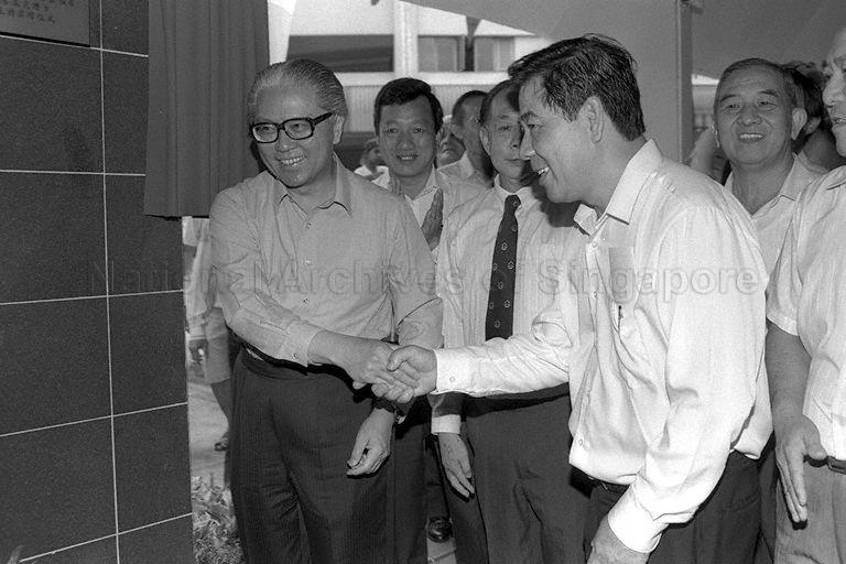 Deputy Prime Minister and Minister for Defence Dr Tony Tan Keng Yam (left) exchanging handshakes after the unveiling of plaque during opening ceremony of upgraded Marsiling Market/Cooked Food Centre at Marsiling Lane.