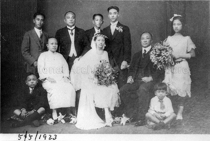 Lim Nee Soon (standing second from left) and wife Madam Wee Peck Hay (seated second from left) in a group photograph taken on the occasion of the marriage of their eldest daughter Lim Chit Geck (seated third from left) with Oei Tjong Tiong (back row, right) who is the son of Indonesian sugar king Oei Tjong Ham (Oei Tiong Ham) (seated right).