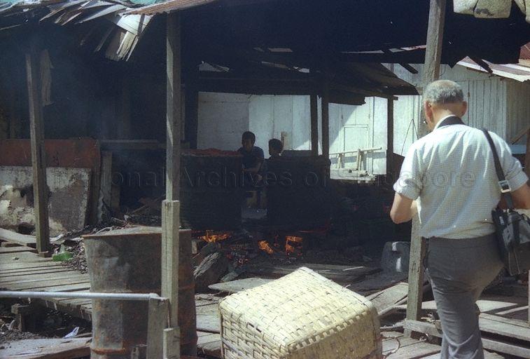 Steaming sea mussels (also known as 'kupang' in Malay) at Punggol Point.