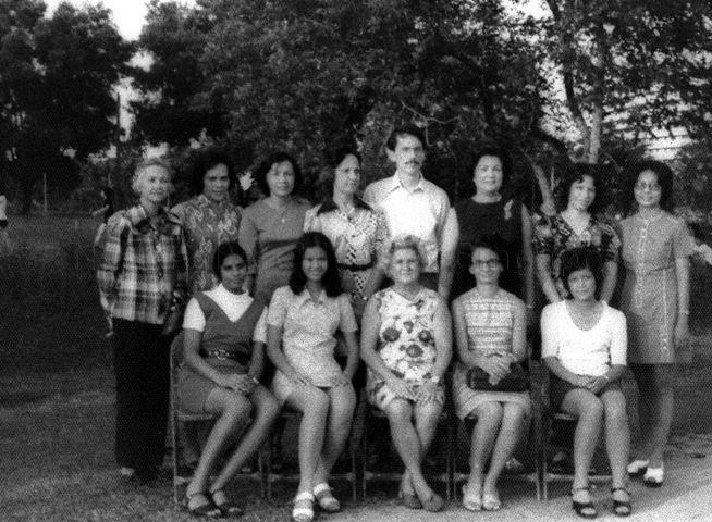 Group photograph of Singapore Girls' Sports Club (GSC) Committee at Club ground, 7990F Serangoon Road -- Seated from left, S Sarojanee, Yolanda Nerva, President of GSC Mrs Zena Tessensohn, Dr Sheila Houghton and Merle de Souza. Standing from left, Dorothea Ebert, Gloria Beck, Pam Armstrong, Audrey Milne, John Oehlers, Margaret Clarke, Dorothy Tessensohn, Angeline Ee