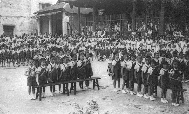 Students of Chong Hock Girls' School at the assembly hall in Thian Hock Keng. The school had the first intake of boys in 1949.
