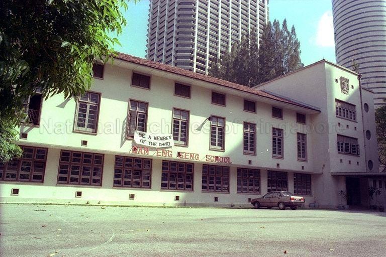 Gan Eng Seng School - View of main block at Anson Road. The outdoor school crest can be seen on the right, overlooking the entrance. It is one of two crests designed by renown Italian sculptor Cavaliere Rudolfo Nolli for the school.