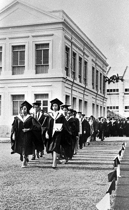 View of teachers in procession at Raffles Institution's 141st anniversary and Founder's Day celebration. Leading the procession are Ms Doreen Thambiayah (left) and Mrs Tan Cheng Lim.