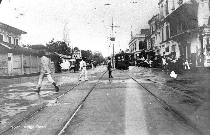 This is Bras Basah Road looking from North Bridge Road junction toward Victoria street. CHIJ (Chimes) structure can also be seen (middle left portion).