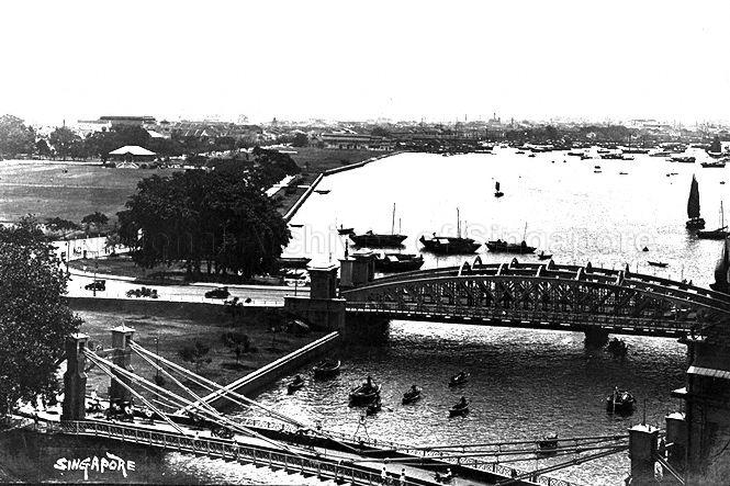 View of Cavenagh Bridge (front) and Anderson Bridge (back) over the Singapore River 