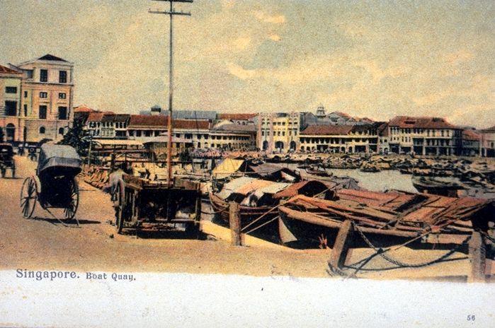 Boat Quay with part of the Colonial Secretariat offices visible on the left. Across the Singapore River is the Bonham Building (centre), housing Katz Brothers Limited. It was demolished in 1970 to make way for the 30-storey United Overseas Bank.