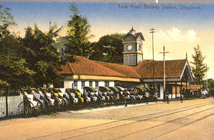 Tank Road railway station with jinrickshaws parked outside waiting for passengers. The station served as the main terminus for passenger trains coming down from the Woodlands jetty on the Singapore-Kranji Railway. Opened in 1903, the station was closed in 1932 when the Tanjong Pagar station opened.