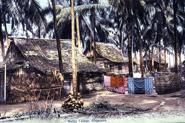 Houses in Malay "kampong" (village), with pieces of "sarong" (large tube or length of fabric worn as lower garment by the Malays) hanging on laundry line, Singapore