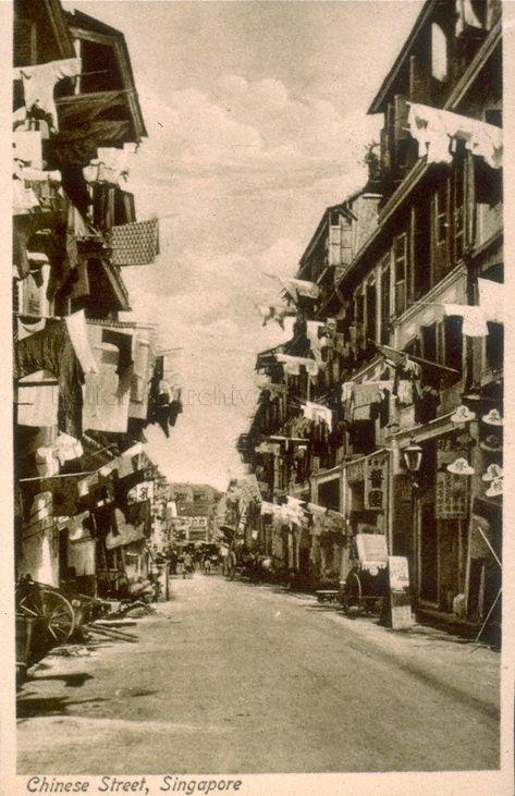 A Singapore postcard illustrating a typical afternoon street scene in Chinatown.
