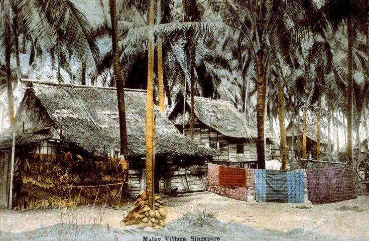 Houses in Malay "kampong" (village), with pieces of "sarong" (large tube or length of fabric worn as lower garment by the Malays) hanging on laundry line, Singapore