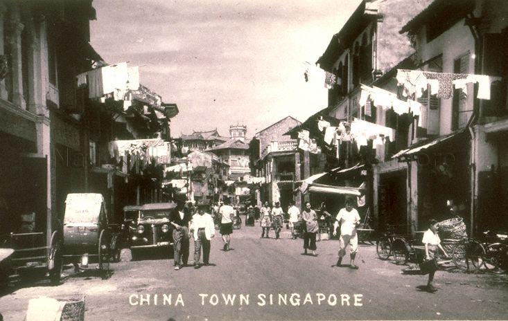 Street scene and shophouses along China Street, looking towards Club Street and buildings on Ann Siang Hill (background)