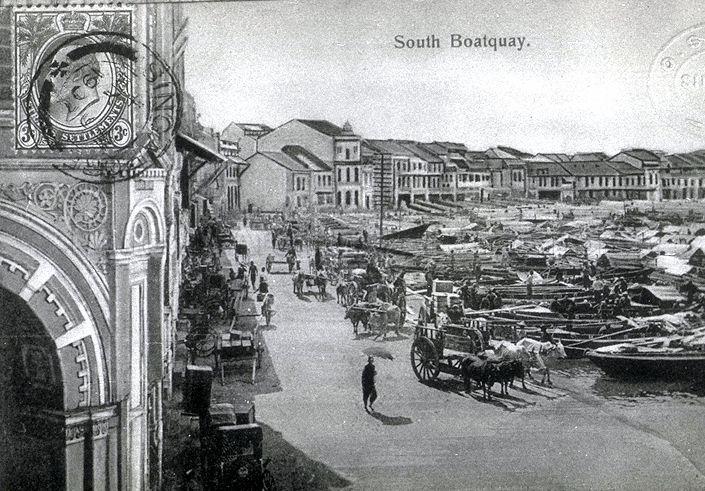 Boat Quay as seen from Cavenagh Bridge. The ornate building on the left housed the offices of Katz Brothers Limited at the corner of Bonham Street and Boat Quay.