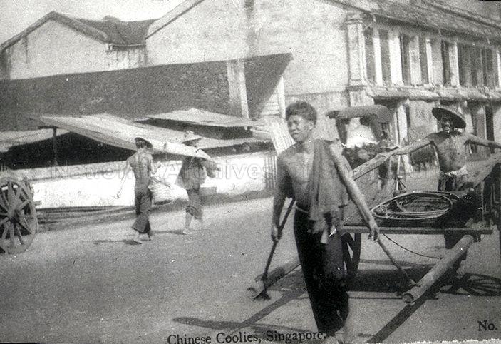 Man pulling handcart, one of the earliest forms of transport in Singapore