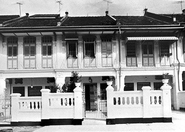 This is No. 63 Emerald Hill Road. The perimeter wall and gate have not changed to this day. The two plants above the gate posts are now replaced by cactus plants.
