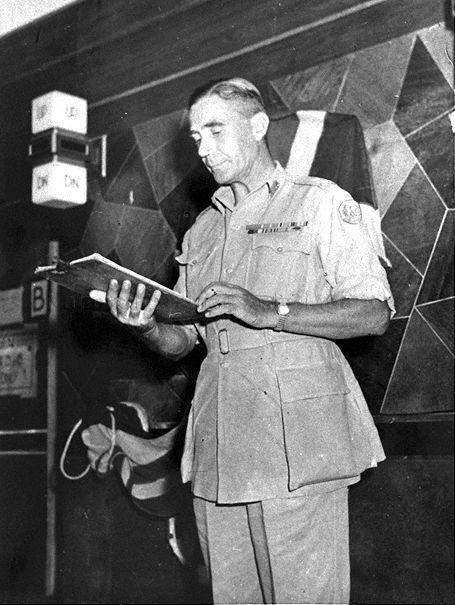 Major-General B C H Kimmins speaking during the unveiling of a brass plaque presented by Admiral Lord Louis Mountbatten to Mrs Loke Yew and Mr Loke Wan Tho, owners of Cathay Building. The plaque commemorates the setting up of SACSEA (Supreme Allied Commander South East Asia) headquarters in Cathay building from November 1945.
