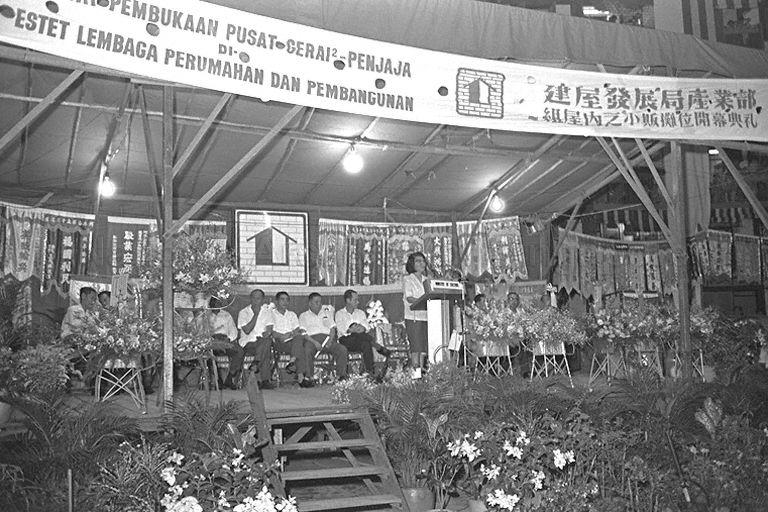 Member of Parliament for Delta Constituency Madam Chan Choy Siong speaking during official opening of hawker stalls at Block 50, Havelock Road, Bukit Ho Swee Estate.