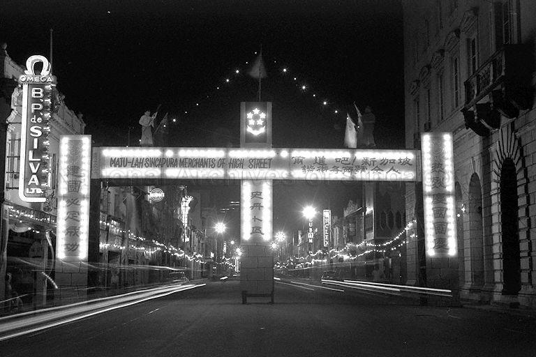 National Day Parade 1966 at the Padang - View of decorations for National Day along High Street at night