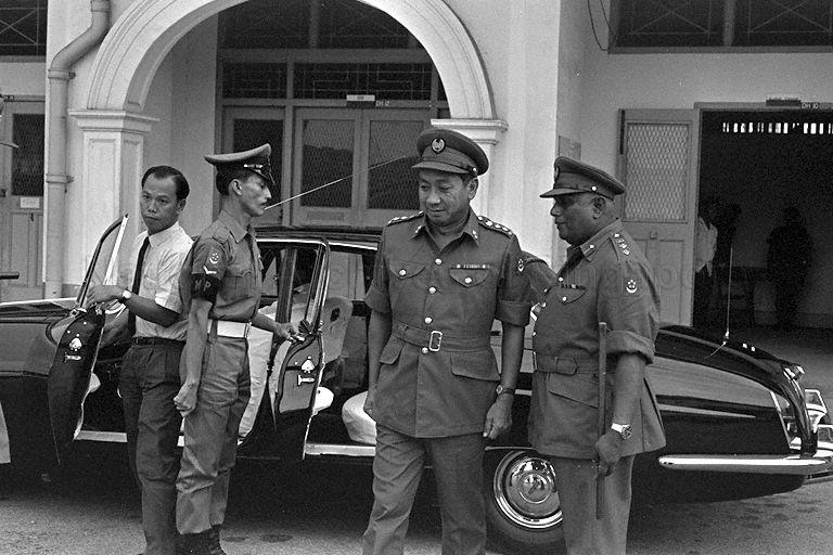 Minister of Defence Dr Goh Keng Swee (second from right) …