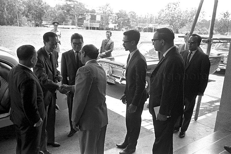 Acting Director of Broadcasting P S Raman (back to camera) welcoming Cambodian Deputy Prime Minister and Vice-President of Council of Ministers Son Sann when he arrives for a visit of Television Singapura at Caldecott Hill.