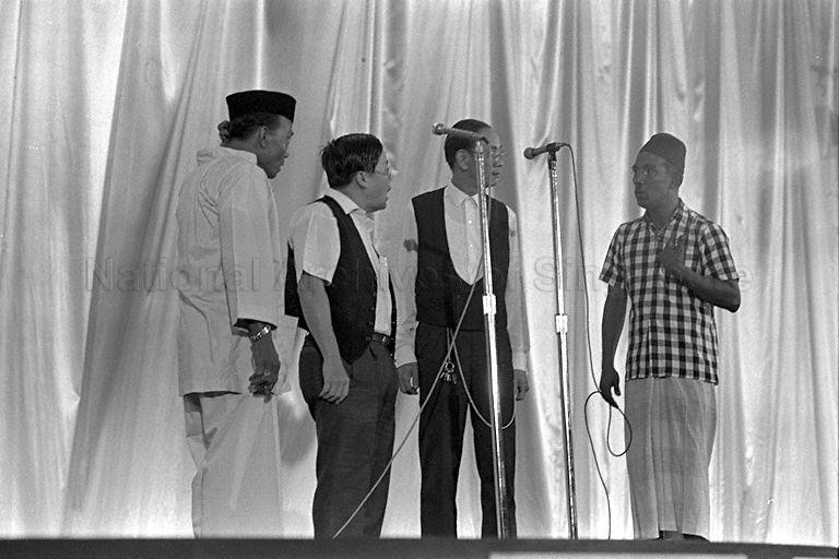 Singapore's "Fat-and-Thin" comic duo, Ya Fong and Wang Sa, giving a performance during opening of National Language Month at National Theatre