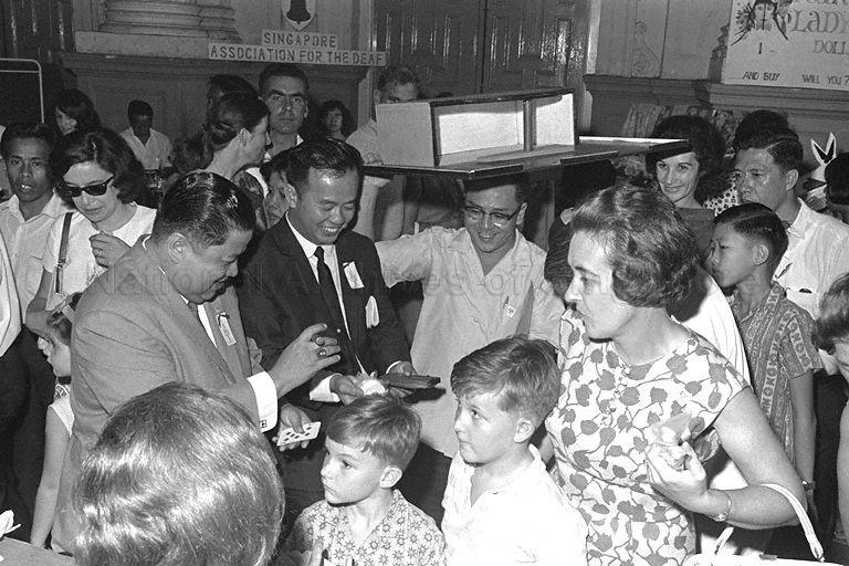 District President of St John Brigade Dato Aw Cheng Chye, who is the nephew of Mr Aw Boon Haw, at opening of Christmas Fair 1966 organised by Children's Charities Association held at Victoria Memorial Hall