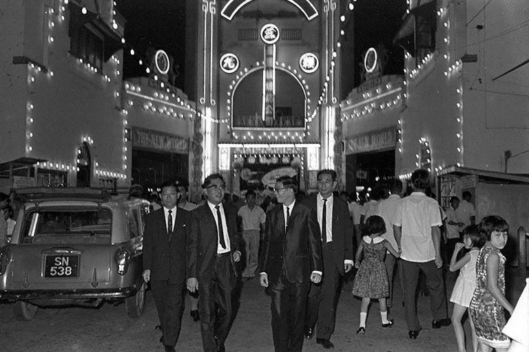 Parliamentary Secretary to Ministry of National Development Ho Cheng Choon touring New World Trade Fair at New World Amusement Park in Jalan Besar during its opening