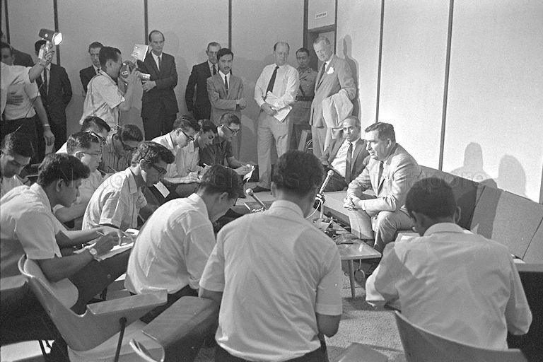 British Defence Secretary Denis Healey giving a press conference upon his arrival at Paya Lebar International Airport. Seated beside him is Minister for Foreign Affairs S Rajaratnam.