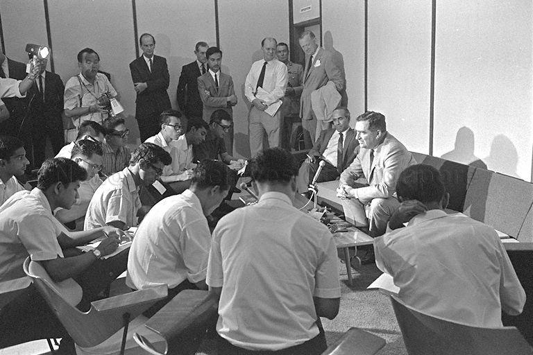 British Defence Secretary Denis Healey giving a press conference upon his arrival at Paya Lebar International Airport. Seated beside him is Minister for Foreign Affairs S Rajaratnam.