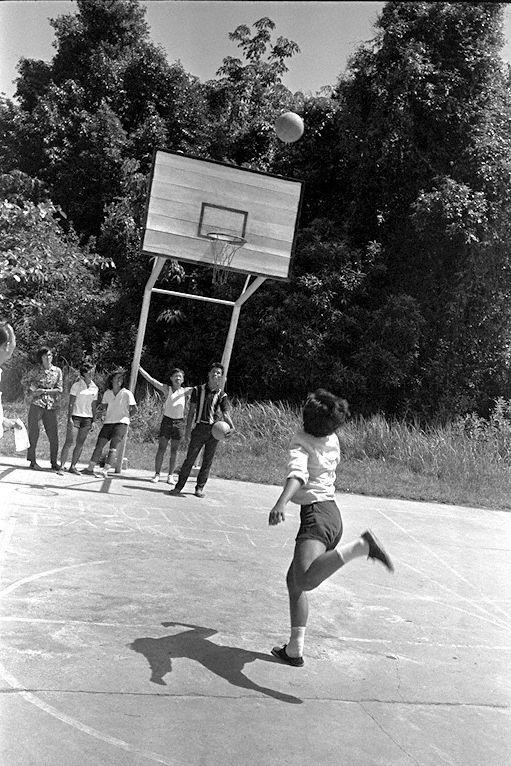 Shooting basketball into the net at Outward Bound School (OBS) in Pulau Ubin. 60 youths were on the island for a 17-day training course with OBS.