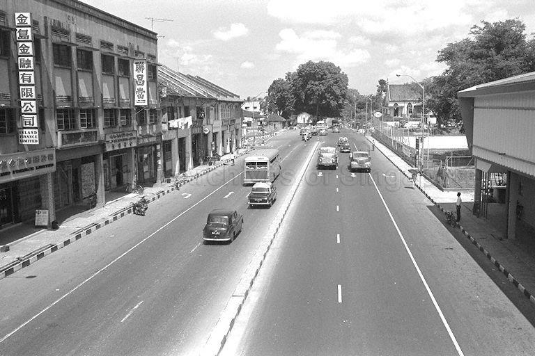 View of Upper Serangoon Road near the junction with Upper Paya Lebar Road. Paya Lebar Methodist Church is in the background on right.