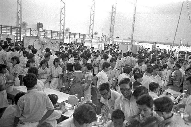 Students exploring an exhibition at New Town Secondary School. Minister of State for Education Rahim Ishak (not pictured) is at the school to officiate at the opening of "Week of Service 1967".