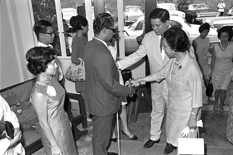 Japanese Prime Minister Eisaku Sato's wife Mrs Hiroko Sato (right) is welcomed to the School of the Blind.