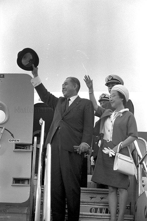 Japanese Prime Minister Eisaku Sato and his wife Mrs Hiroko Sato bidding farewell at Paya Lebar Airport.