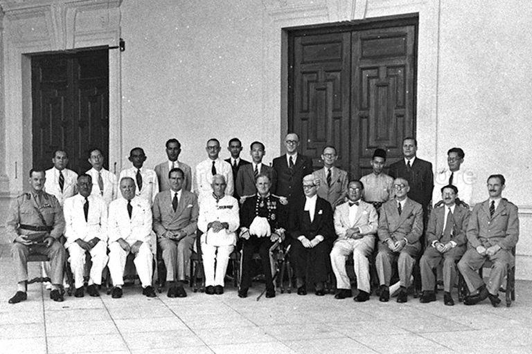 Chairman of Straits Trading Company and President of Singapore Chamber of Commerce Ewen Fergusson (seated fourth from left) in a group photograph with other members of Legislative Council of the Colony of Singapore
