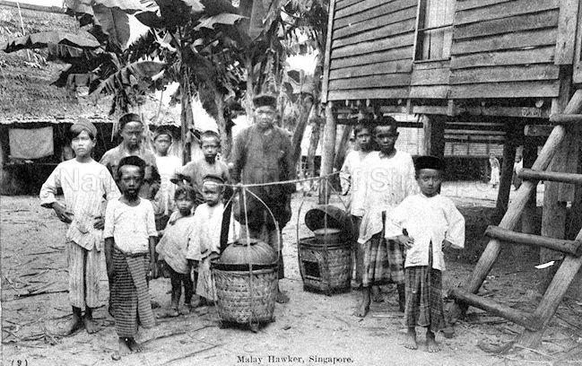 Malay "kueh" or cakes hawker carrying his wares and Malay boys in a "kampong" or village, Singapore
