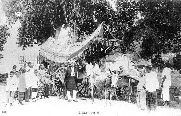 Bullock cart decorated for Malay festival, with roof shaped like those of houses in Minangkabau in western Sumatra and Negri Sembilan in Malaysia