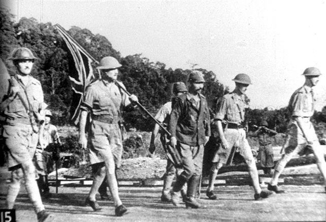 Lieutenant General Percival (right) and other British officers on the way to Ford Factory at Bukit Timah to surrender, marking the beginning of the Japanese Occupation of Singapore