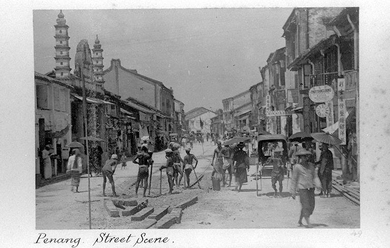 The building with two minarets (on the left) contains the tomb dedicated to shipping magnate and philanthropist Mahomed Noordin Merican (1802 – 1870). From the 1830s, he was a major shipper of rubber, pepper and textiles from the ports of Bombay, Calcutta, Nagapatnam, Aceh, Burma, Penang and Singapore. His name survives in the Singapore company F M Noordin &nbsp;Co owned by the family of one of his employees.