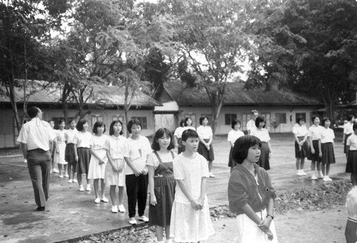 Teachers and students of Thomson Shin Min Public School assembling at courtyard for farewell ceremony on final day of operation for the school before its closure