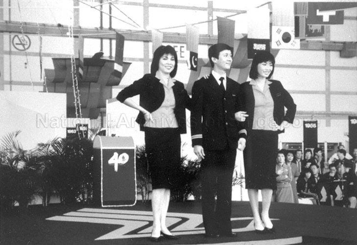 Flight steward Vincent Seow Teck Chye and stewardesses modelling the yellow and black uniform worn by the cabin crew of Malaysian Airways Limited (MAL) on domestic flights in the 1960s, during Singapore Airlines' (SIA) 40th anniversary celebration. The abbreviation MAL was retained when Malayan Airways Limited was renamed to Malaysian Airways Limited in 1963 following the formation of Federation of Malaysia. MAL was renamed again to Malaysia-Singapore Airlines (MSA) in May 1966, which subsequently separated into two national carriers, Malaysia Airline System (MAS) and SIA in 1972.