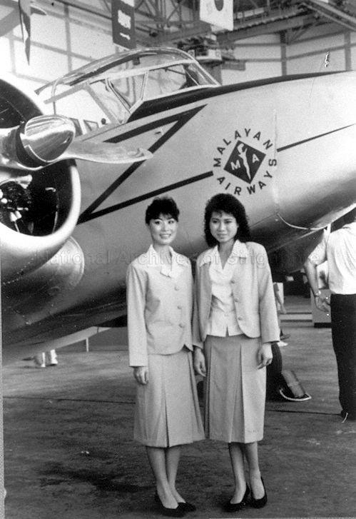 Initial uniform worn by Malayan Airways flight stewardesses comprising sky-blue jackets with white collared blouses, matching pleated skirts and plain black court shoes. This set of uniform was worn from 1947 to about 1956.