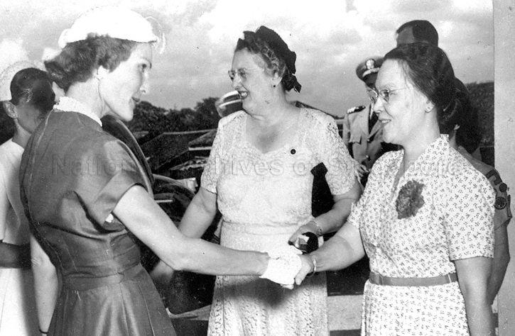 Mrs Richard Nixon, wife of Vice President of the United States, being greeted by Principal of Methodist Girls' School (MGS) Mrs Ellice Handy upon arrival at the school in Mt Sophia for a visit
