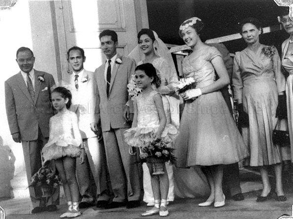 Wedding of Alan Jeltes and Catherine de Souza. The bridesmaid is Jean Stewart, daughter of former Dean of the Singapore diplomatic corps Stanley Stewart. On the left is the bride's uncle Geoff Tessensohn and his daughter Denyse Tessensohn is the flower girl on the right.