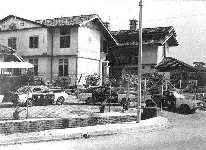 Ford Cortina police cars at Orchard Road Police Station