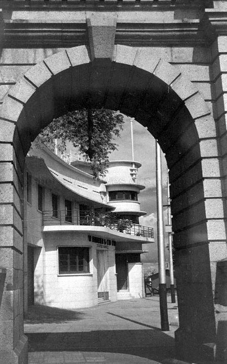 Waterboat Office at 3 Fullerton Road, located just after Anderson Bridge. The Waterboat Office shown in the photograph was completed in 1949. It was designed by Swan and Maclaren. Work on it actually started in 1941, but its construction was delayed by the war.