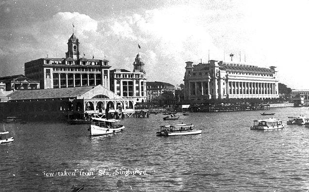 View of Collyer Quay from the sea, Singapore. Clockwise from left : Clifford Pier, Union Building, Hongkong and Shanghai Bank building, Whiteaway Laidlaw building and Fullerton Building.